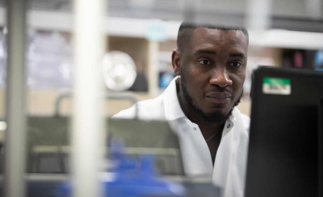 Onyeka Chukwudozie conducts research in a laboratory.