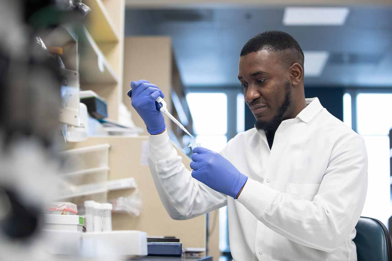 Onyeka Chukwudozie conducts research in a laboratory.