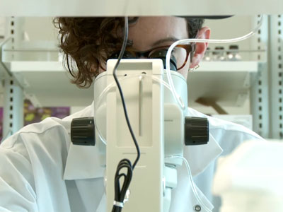 cressida madigan looking into a telescope